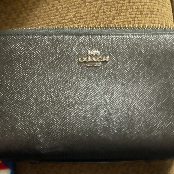 Coach Handbags - Large coach wallet black with pewter coach logo.
